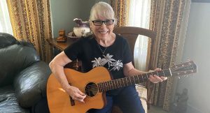 Edwina Lewis in her home