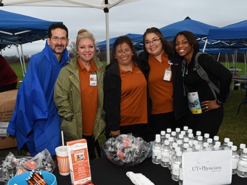 The UT Physicians tent along the race route in February 2018. Photo credit: Dwight Andrew, McGovern Medical School