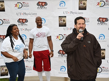 Tomia Austin, As One Foundation, Devard Darling, As One Foundation Founder, Andrew Casas, COO of UT Physicians made the opening remarks to start the 2018 run. Photo credit: Dwight Andrews, McGovern Medical School.