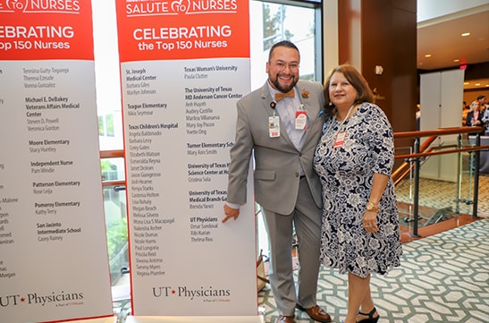 Omar Sandoval, MD, with his mother Elva Medina, at the 2019 Salute to Nurses luncheon. Photo by: Melissa McDonald, UT Physicians