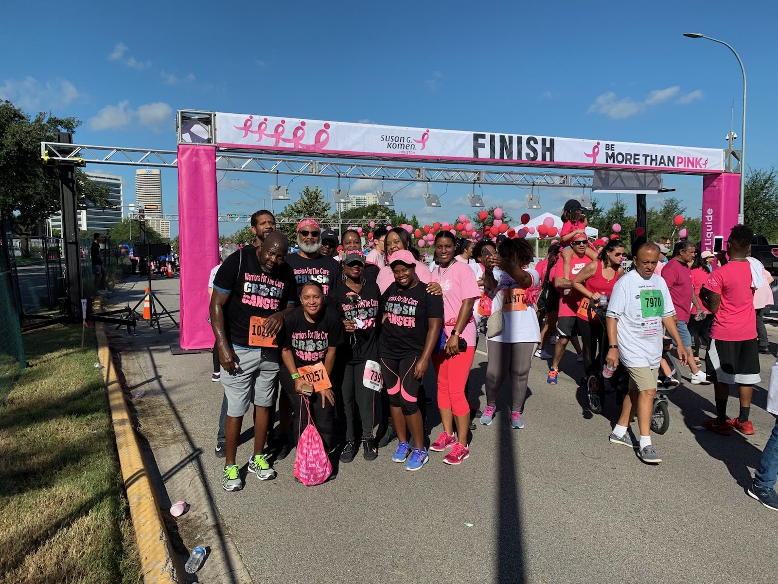 Carla Square celebrating another completed race to raise awareness and research dollars for breast cancer.