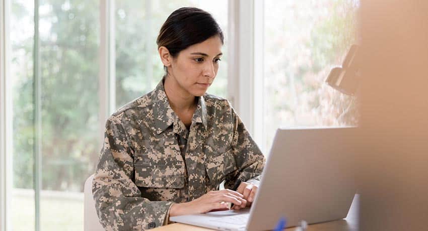 female soldier working from home