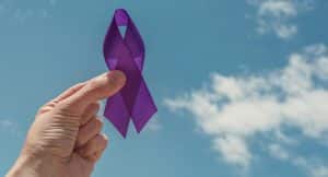 Purple ribbon to note Pancreatic Cancer Awarness