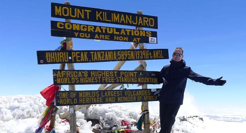 Steve Dome poses for a picture on Mt. Kilimanjaro in August 2018.