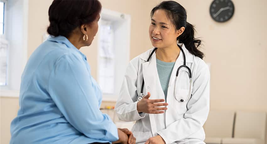 Doctor and patient discussing treatment in a clinic