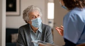 doctor with older patient