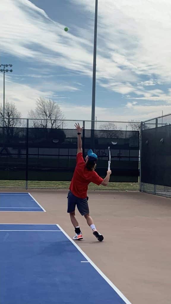 Luke Henley on the tennis court