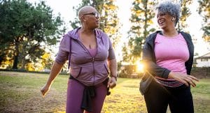 women walking in a field together