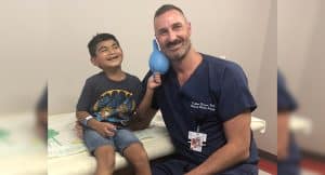 Jae Beltran, now 7, sees pediatric plastic surgeon Matthew Greives, MD, for annual checkups to monitor his cleft lip and palate. (Photo courtesy of Sonia Estrada)