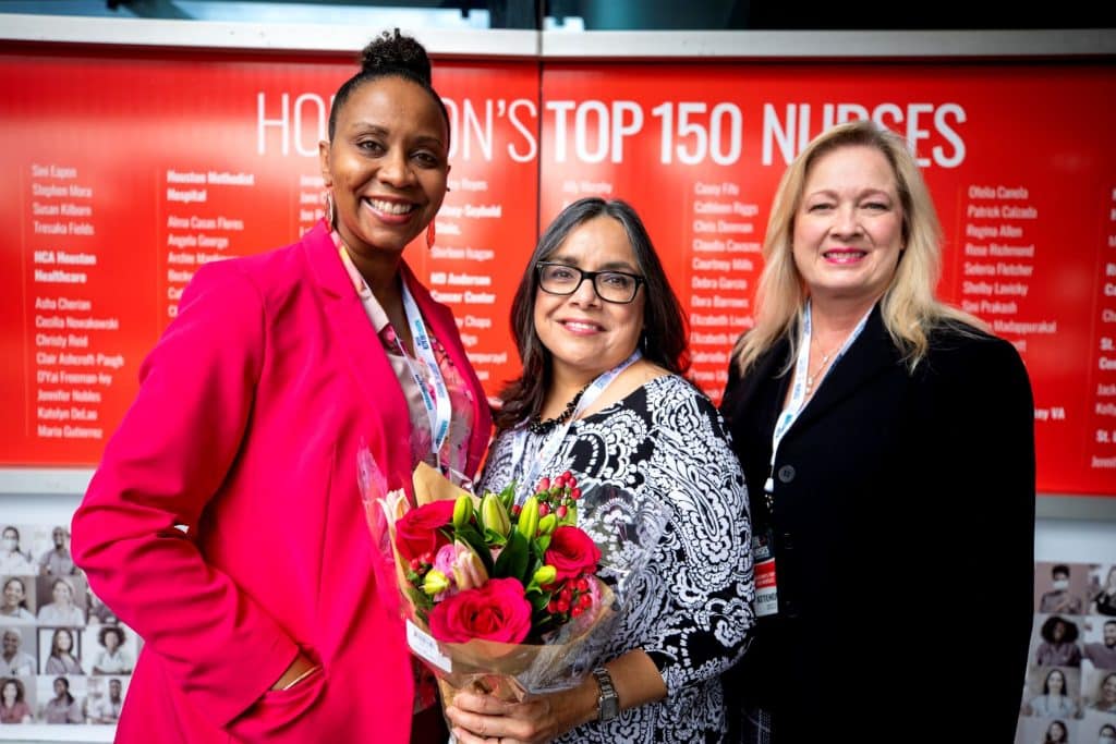 Belinda Figueroa, RN, stands proudly with Veronica Cherry Louis (left) and Rita Willis, RN, BSN, MPH (right)