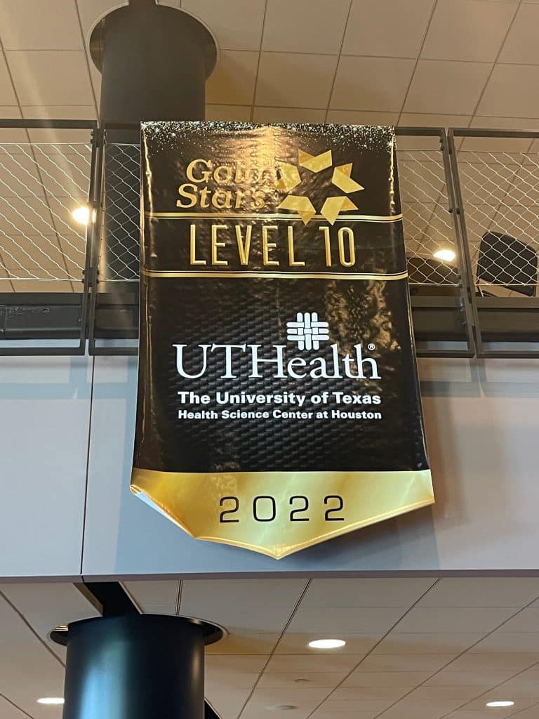 A Gold Stars Level 10 banner hangs for UTHealth Houston