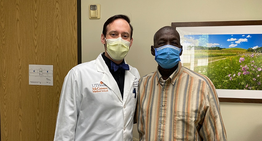 TJ Giden stands with lead surgeon R. Tomas DaVee, MD