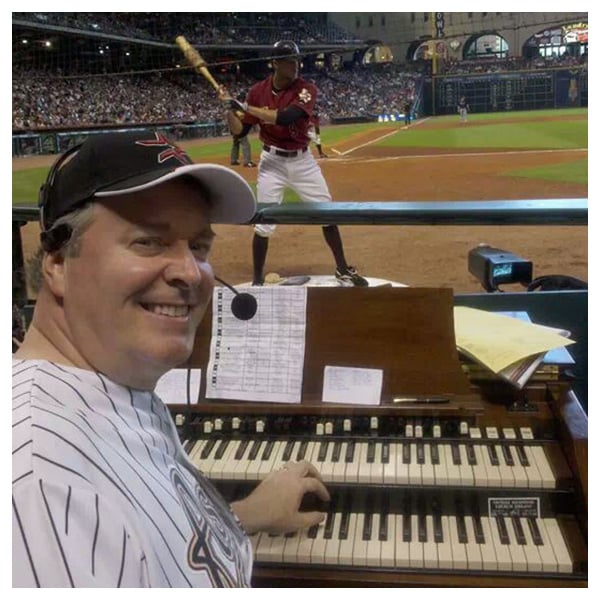 Jim Connors playing the organ at a Houston Astros game
