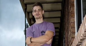 Bryan Reece stands tall with arms crossed