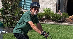 Glen Provost rides his bicycle