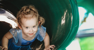 Sweet 2-year-old Nora is playing and excitedly talking with zero signs of developmental issues after being treated for tuberous sclerosis complex at UTHealth Houston. (Photo courtesy of Jennifer Stewart Photography)