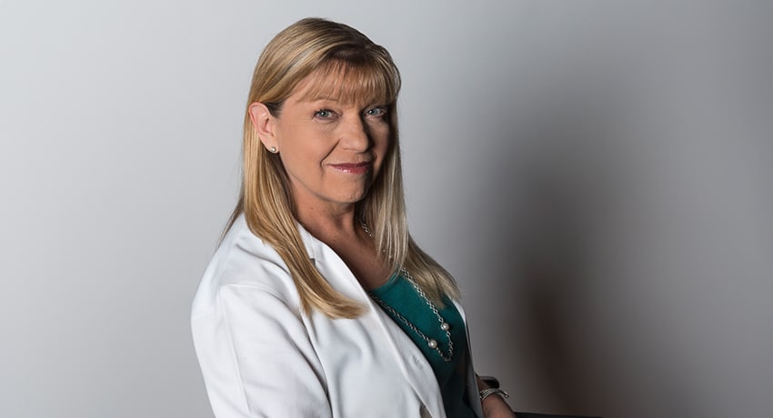 Diana Milewicz, PhD, and her team discovered a novel molecular pathway to explain how a mutation in the gene ACTA2 causes people with no risk factors to develop coronary artery disease. (Photo by UTHealth Houston)