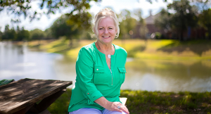 Sue Gordon by a neighborhood lake
