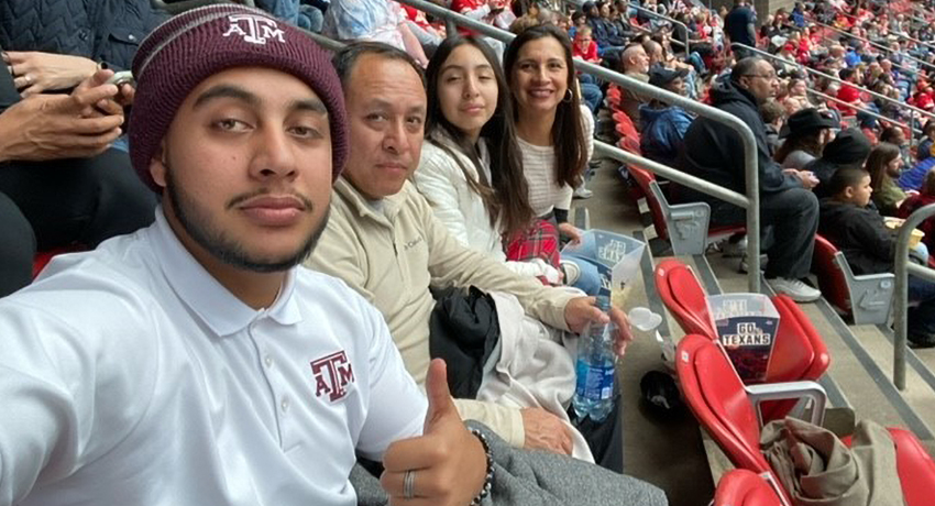 Fernando Carlos and family enjoying a football game