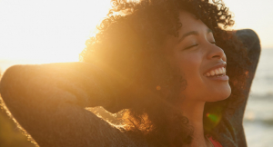 woman smiling in sunshine