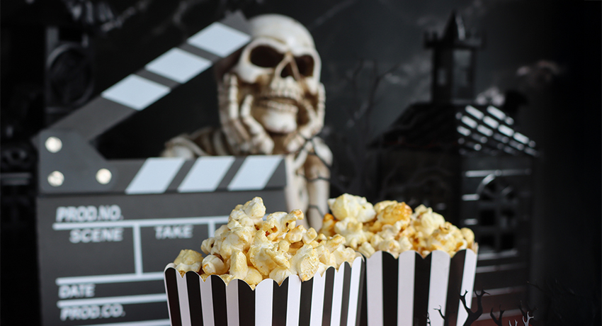 Halloween movie theme with skeleton and popcorn