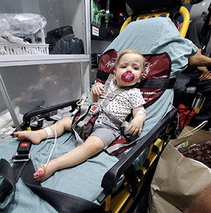 Ellie on a stretcher