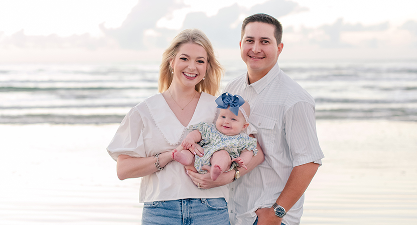 Kacie & Drew Gonzales with baby at the beach