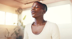 Woman taking a deep breath