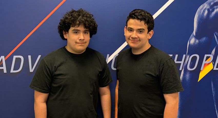 Brandon and Bradley Gonzales, twins standing side by side
