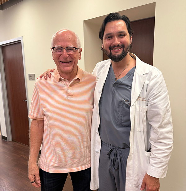 Byron McCormick with James M. Saucedo, MD, following thumb arthritis surgery.